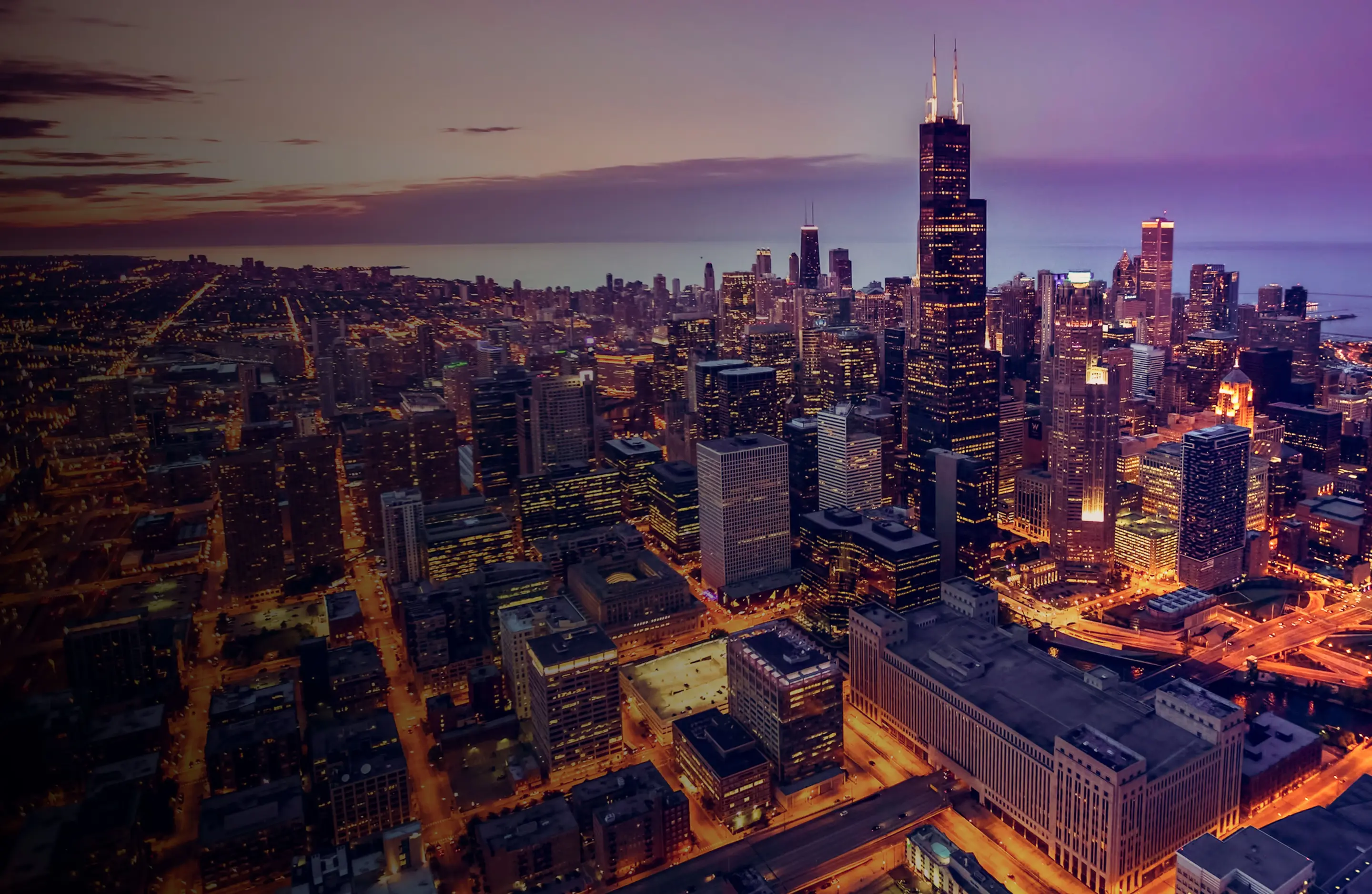 Aerial view of a city skyline at night